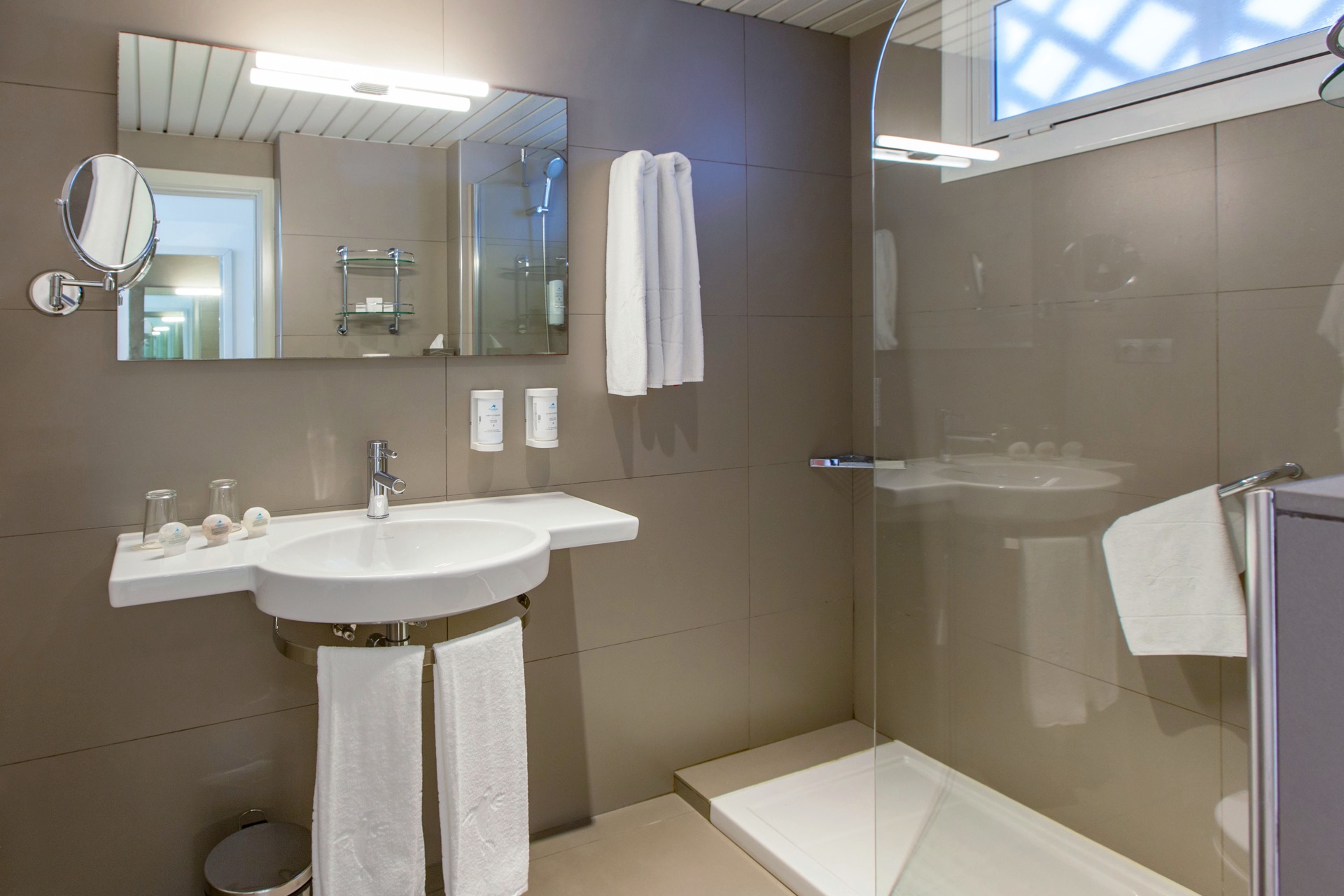bathtroom double standard rooms corallium beach by lopesan hotels