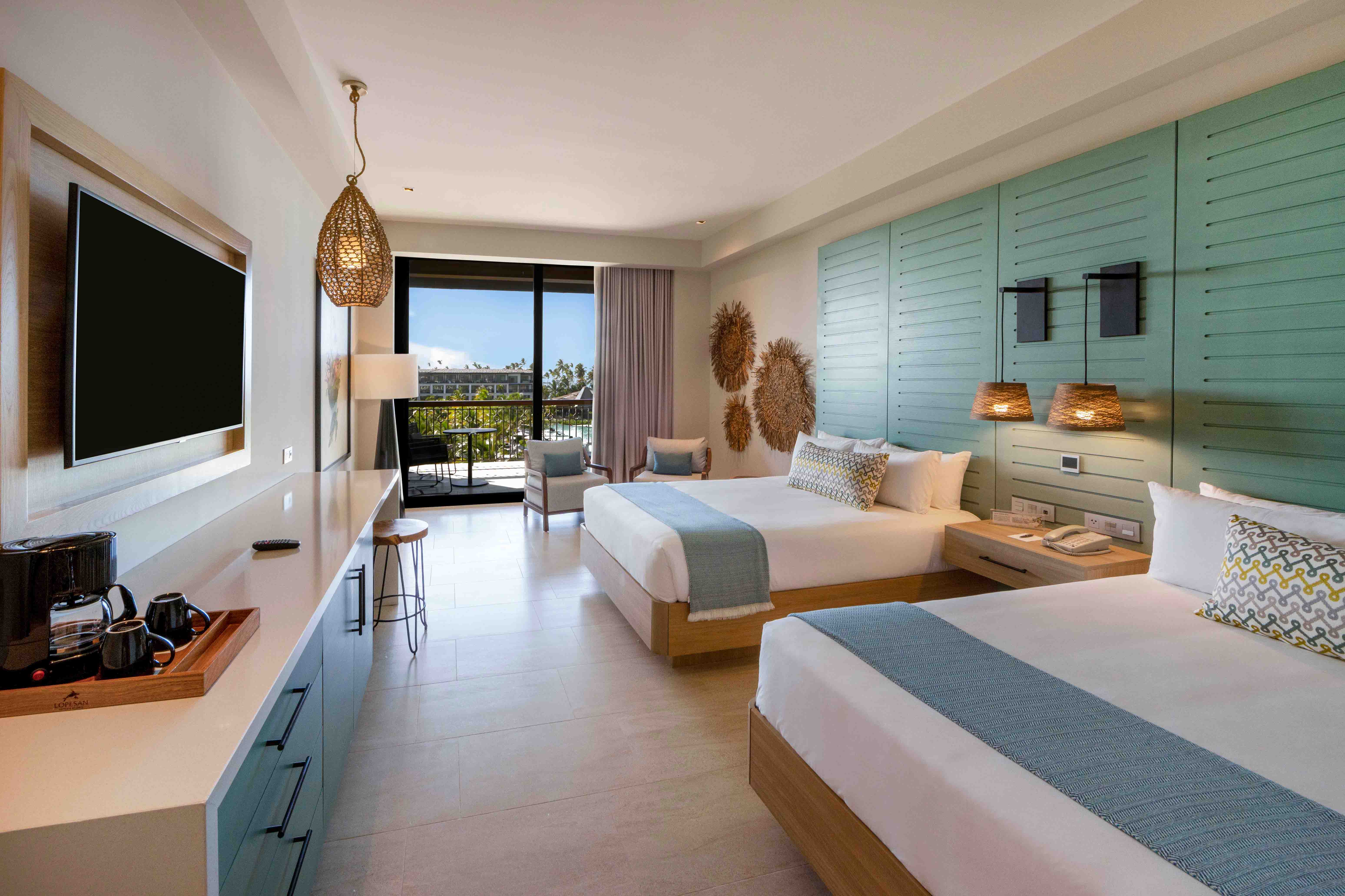 bed unique queen ocean view junior suite lopesan costa bavaro resort, spa & casino