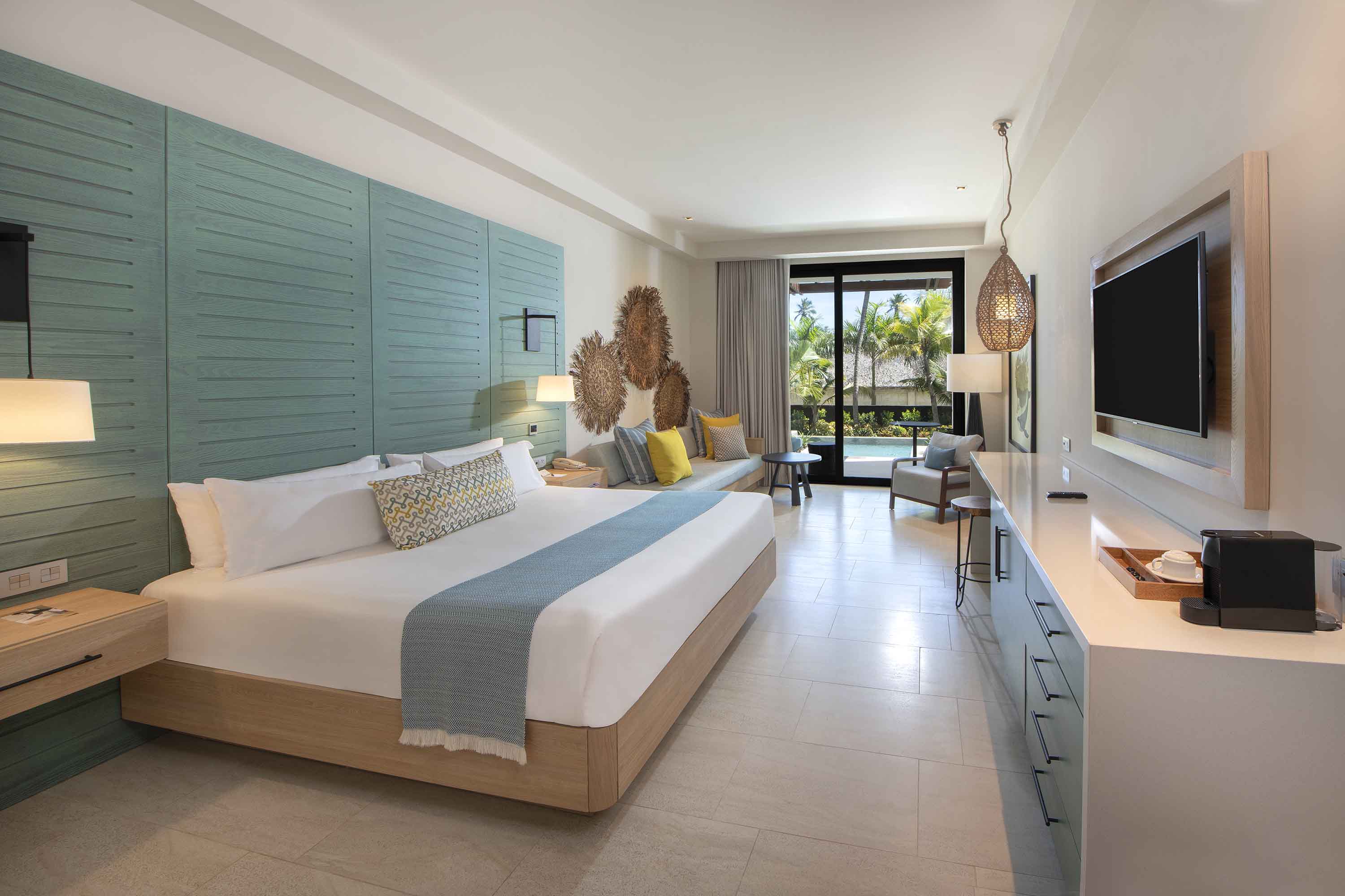 bed unique king swim up junior suite lopesan costa bavaro resort, spa & casino