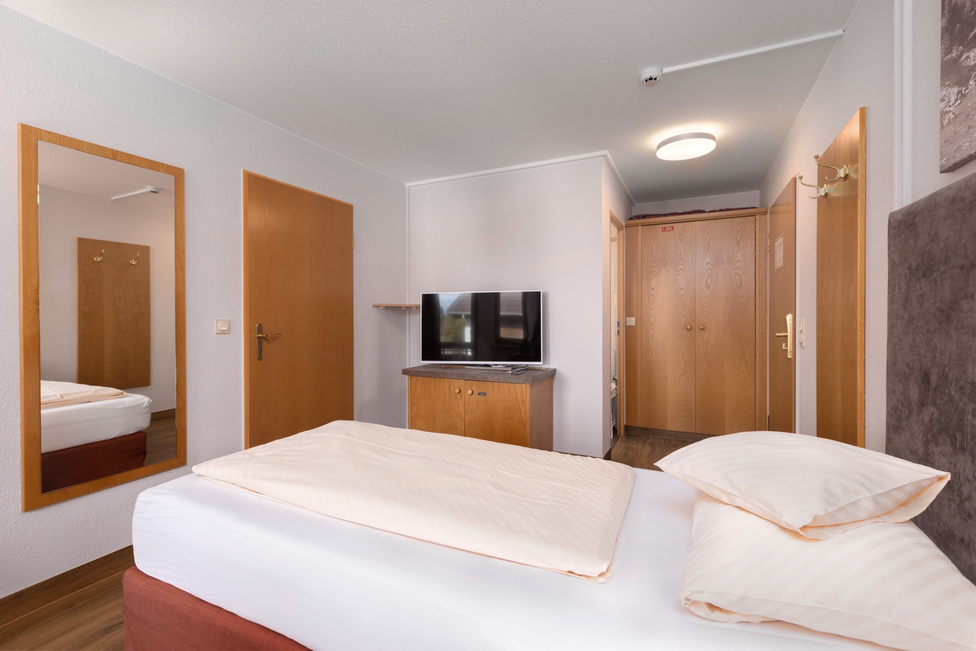 Standardzimmerfotos des Hotels IFA Alpenrose