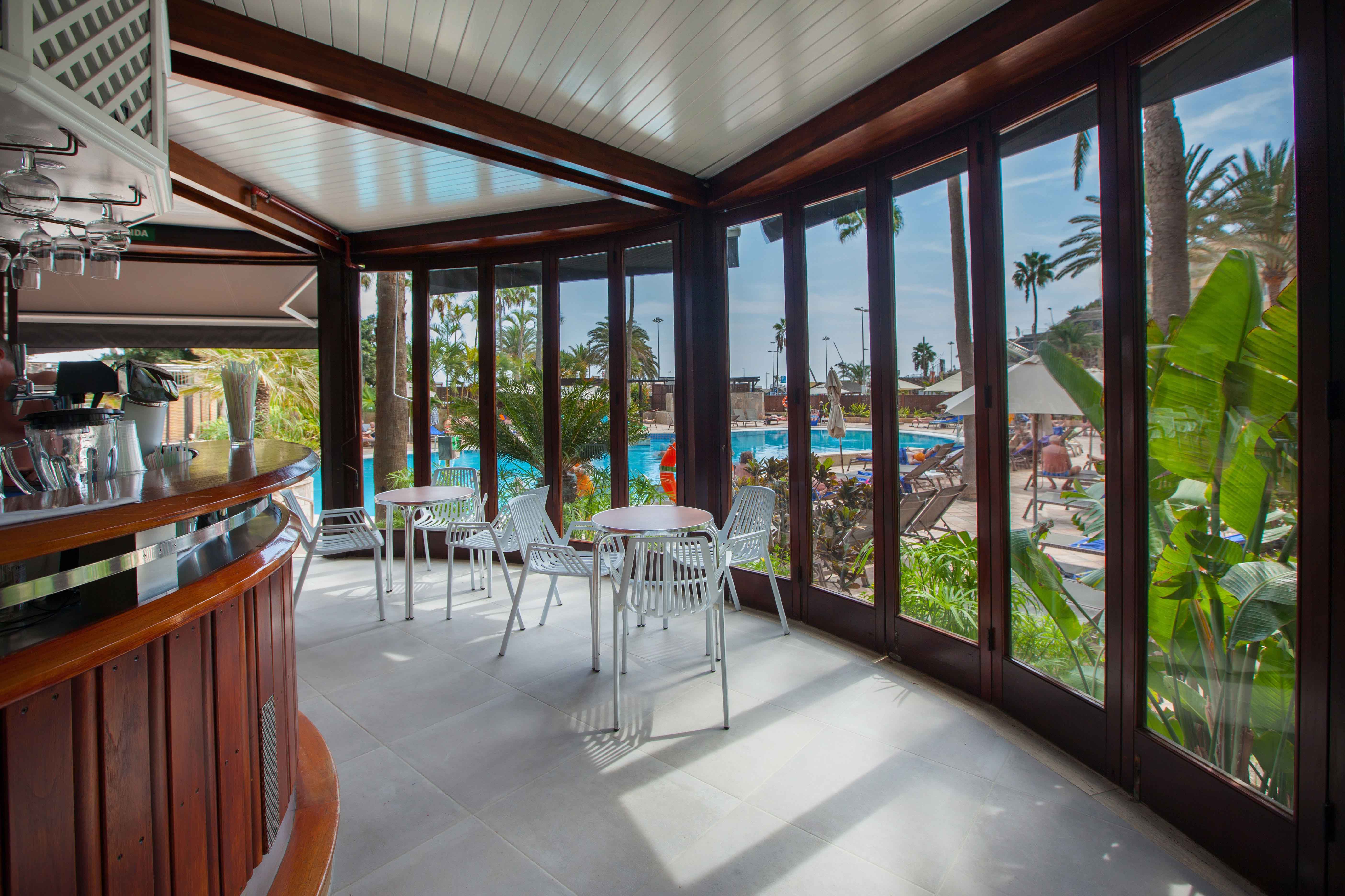swimming pool bar corallium dunamar hotel