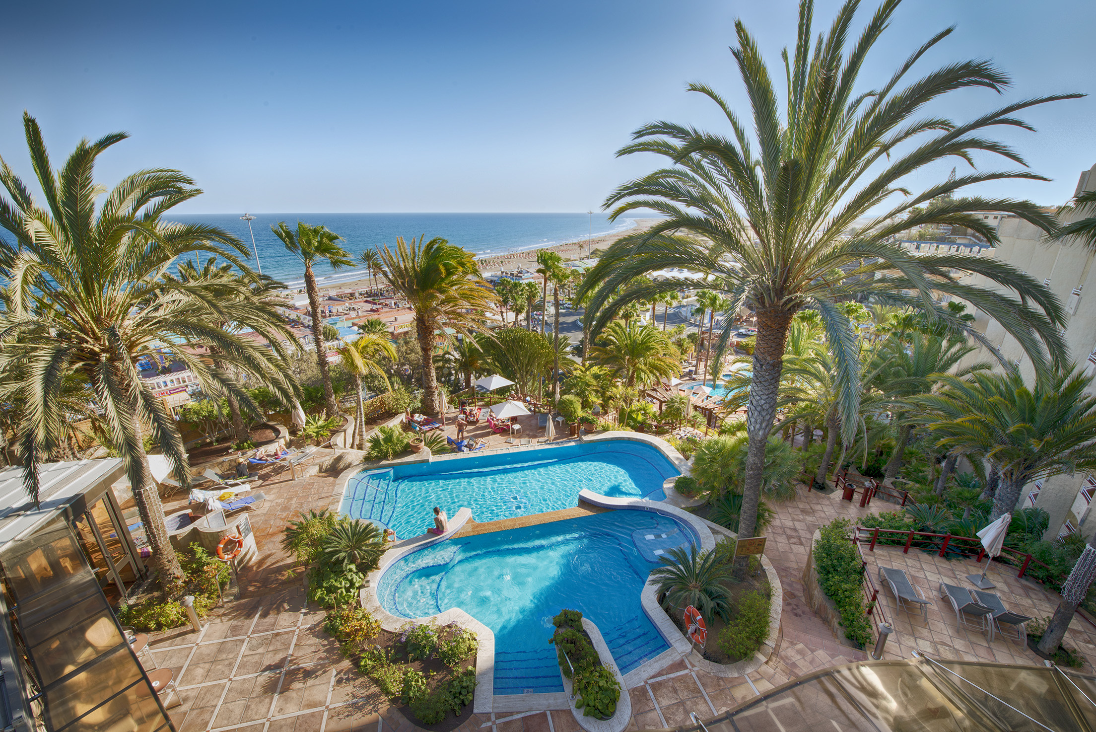 marina pool area corallium dunamar by lopesan hotels